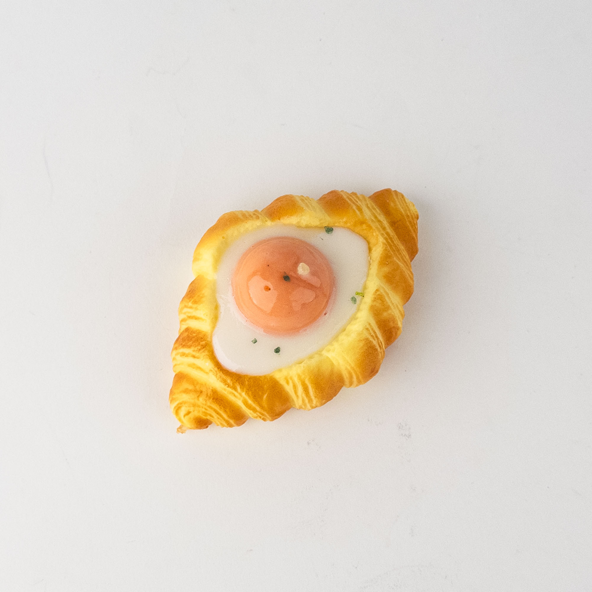Squishy antistres Croissant cu ou 10,5×6,5×4 cm